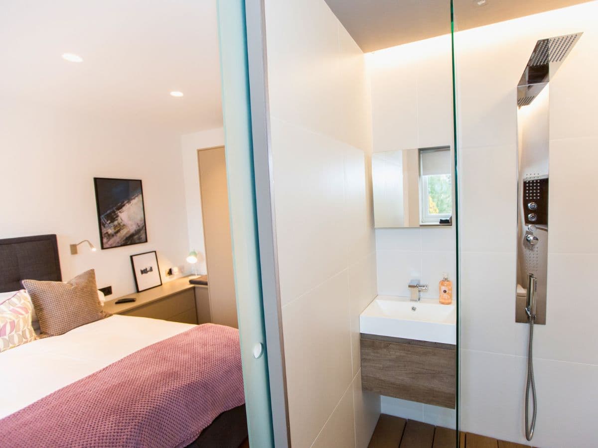 Plaster-in lighting in Hampton bedroom and bathroom