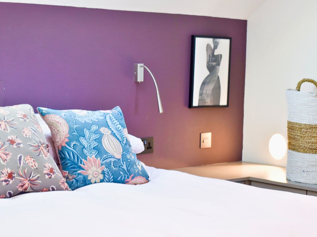Wall lighting installation in a master bedroom, Hampton Court